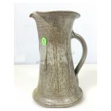 Signed jug pottery sm chip on top & spout