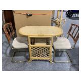 Wicker side table with 2 chairs.