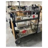 Rolling equipment/workstation cart with contents.