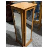 Rotating jewelry valet cabinet with mirrors