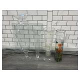 Clear glass vases, tallest one 28in tall