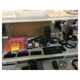 Wii console, Roadking CB radio, tablet cases,