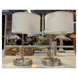 2 lamps. metal bases with outlet and UsB plugs.