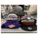 Assorted hats. Some sports.