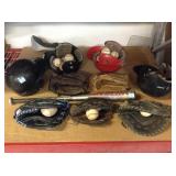 4 baseball helmets, 5 gloves, softball/baseball