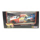 Hot wheels racing 1:24 scale racecar in box.