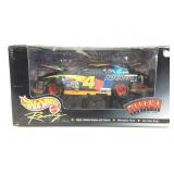 Hot Wheels racing 1:24 scale die cast car in box.