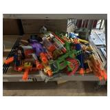 Huge big toy gun pile. Some nerf.