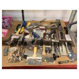 Assorted trowels, scrapers and more. Drywall,