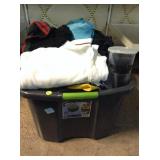 Bin of assorted clothing. Some men