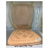 Crafted leather seat cover.