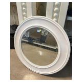 Round wall mirror framed to 32in