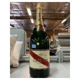 Oversized champagne decorative display bottle.
