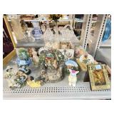 Assorted decorative figurines and frames.