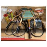 Vintage wood framed sports rackets and more.