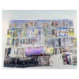 Mixed lot of sports cards in cases