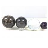 Polished stone spheres w/plastic ring stands &