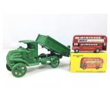 Vtg green toy dump truck, cast iron, 9 in long &