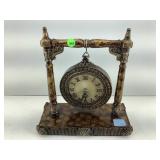 Mantle clock, gold-tone resin, 11 in tall