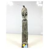 Carved wood guardian figure