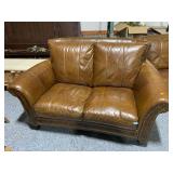 Brown Leather loveseat w/studded accents, approx
