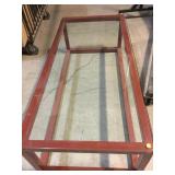 Red Metal coffee table w/glass top from high end