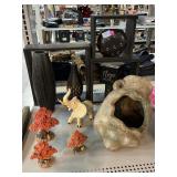 Assorted decorative items. Rustic style pottery.