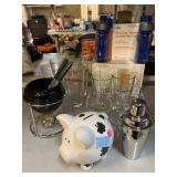 Lucky pig coin bank, casino branded glasses and