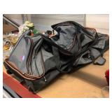 2 rolling duffle bags.