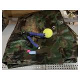 Camouflage Tarp and Phone Stand.