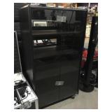 Audio tower center, approx 24x19x44in