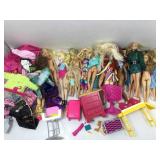 Assorted dolls,  Barbie furniture and more