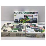3 Tamiya Lotus model build kits.