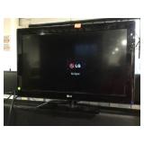 LG 32in TV w/stand and power cord, no remote, mod