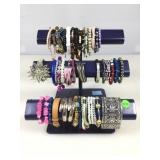 Metal display rack with contents. Fashion costume