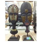 Decorative statues figures on stands