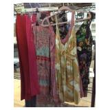 Assorted fashion clothing. Pants and tops