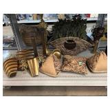 Animal print pillows, wicker basket, candle