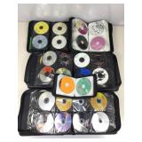 CDs, DVDs collection in organizer totes.