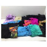 Assorted fashion clothing. Pants and tops