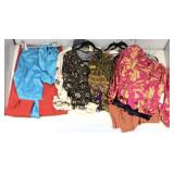 Assorted fashion clothing. Some with tags