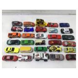 Assorted die cast cars and toys
