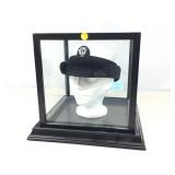 USN Hat on Styrofoam Head in Display Case