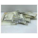 Bagged NOS plastic model plane builder parts.