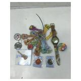 Rock and roll pins, novelty guitar keychains and