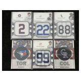 Mixed lot of sports relic cards