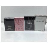 4 sealed NIB perfume sprays. Assorted
