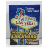 Mini welcome to Las Vegas light up sign in box.