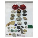 Decorative stones and red glass floral votive