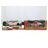 Die cast replica cars in box. Boxes are damaged.